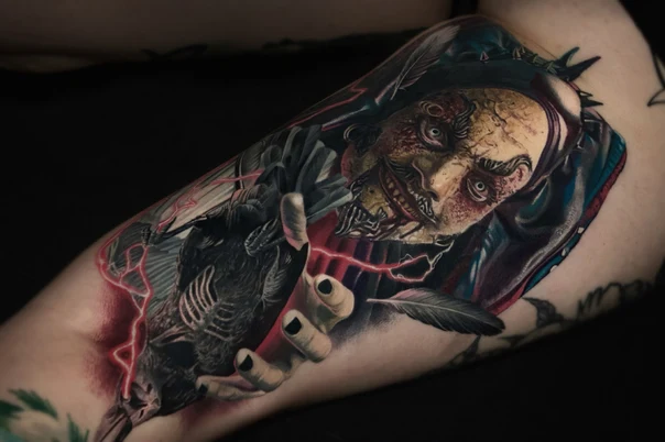 Realism Face, Raven tattoo on Upper Arm