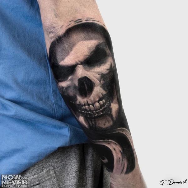 Black & Grey Skull tattoo on Forearm