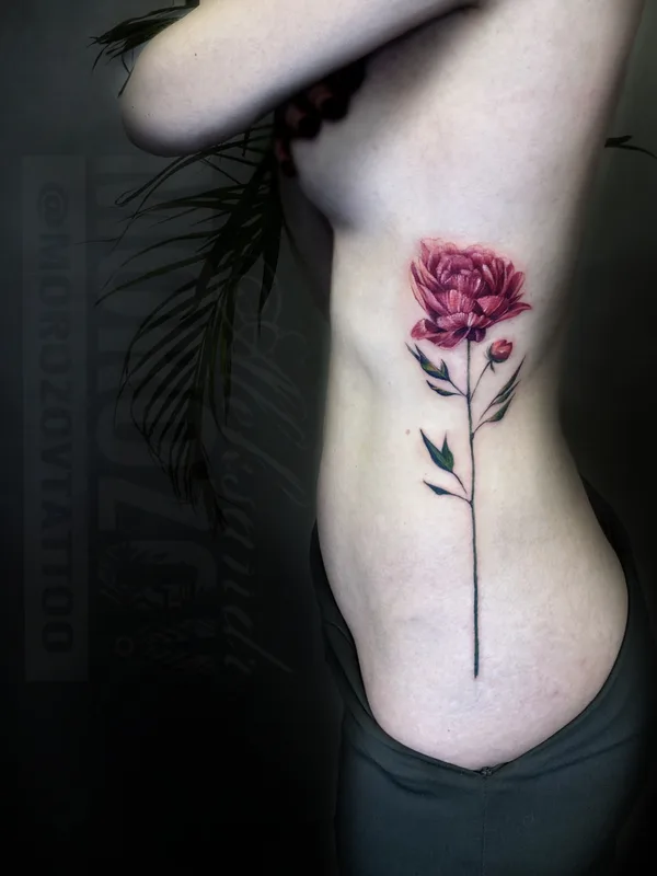 female color botanic tattoo auf ribcage #82472 | Tätowierer Alex Morozov