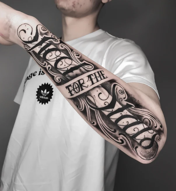 Lettering Lettering, Swirls tattoo on Forearm
