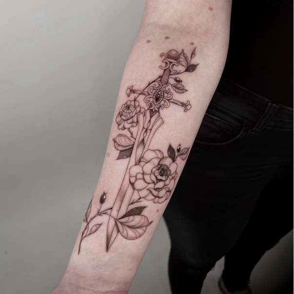 Fineline Sword, Rose tattoo on Forearm