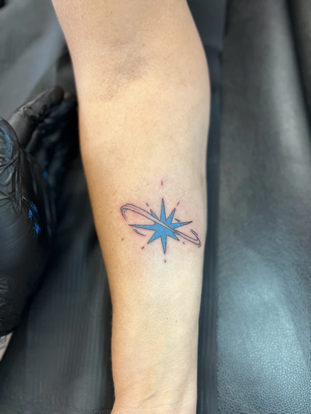 Linework Star tattoo on Forearm
