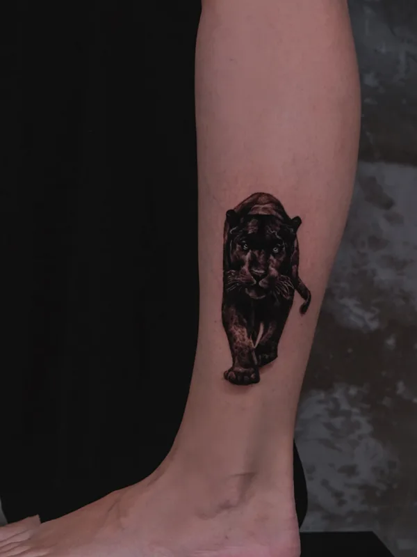 female blackandgrey realism tattoo on calf #85288 | Tattoo Artist Mariia Agafonova
