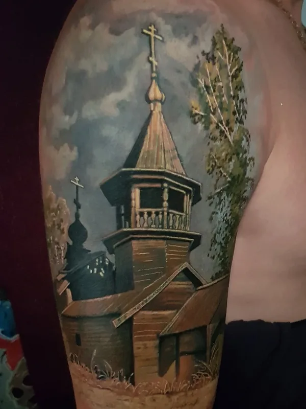 color realism tattoo on upper arm #90001 | Tattoo Artist Дмитрий Чикаев