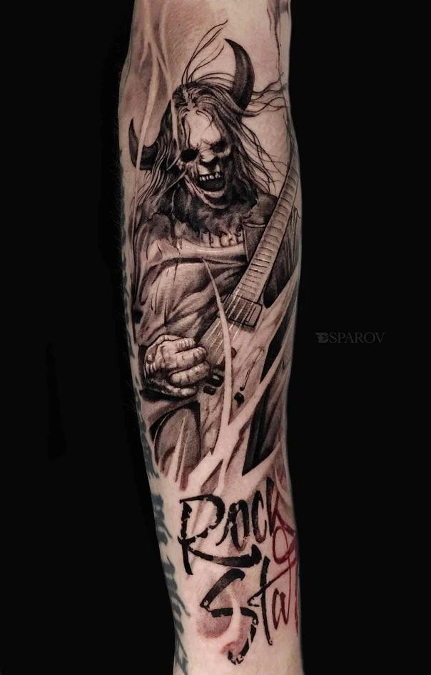 Чёрно-серая Demon, Guitar tattoo на Предплечье