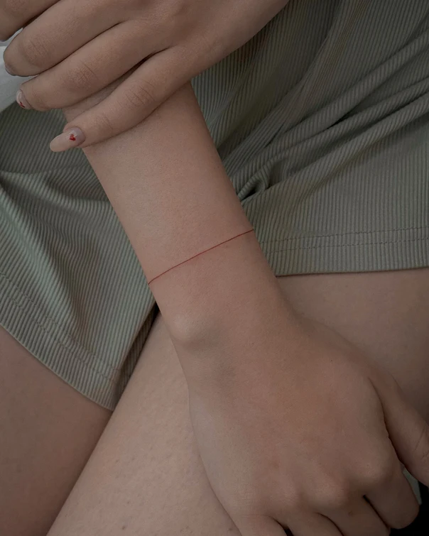 Fineline tattoo on Wrist