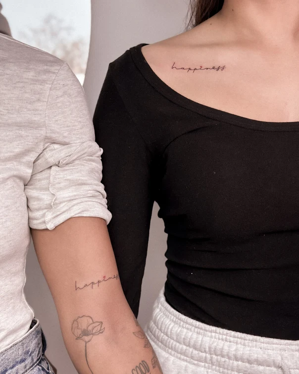 Fineline Word tattoo on Collarbone