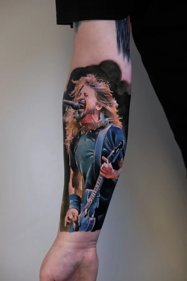 Realism Musician, Guitar tattoo on Forearm
