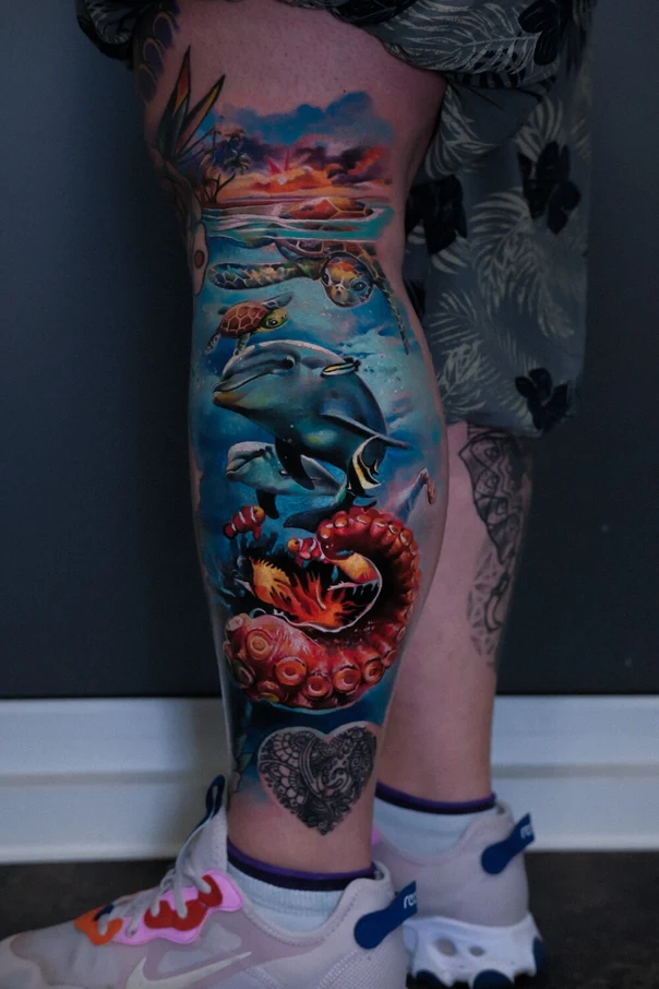 Realism Ocean, Dolphin tattoo on Calf