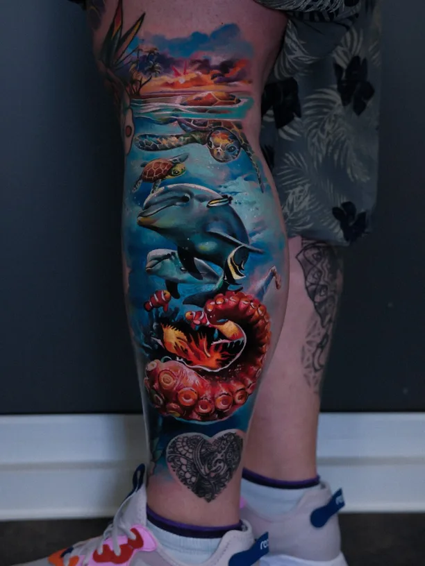 Dolphin Tattoo Meaning: Joy, Safe Passage and Modern Designs