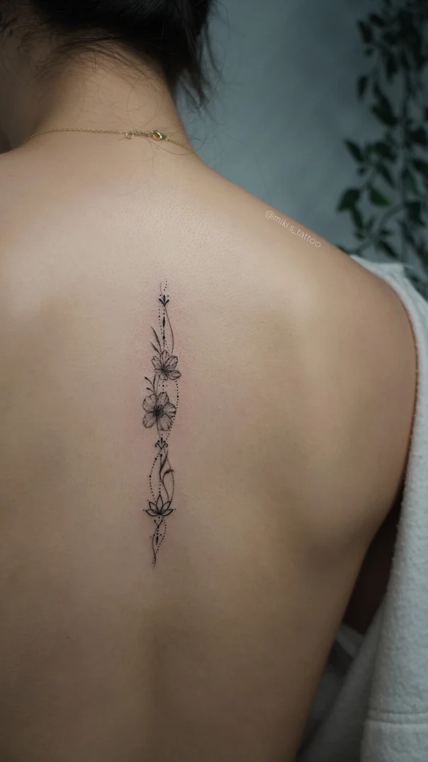 Fineline Flowers, Botanical tattoo on Upper Back