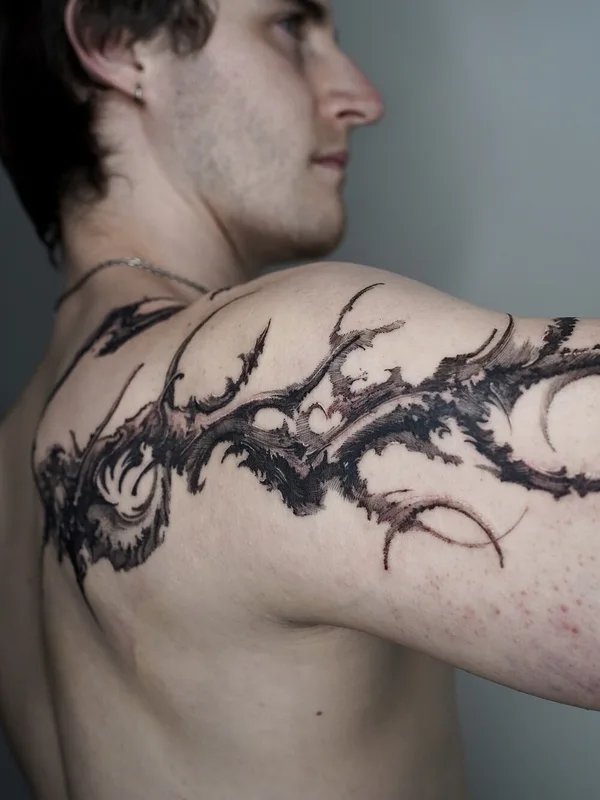 male black and grey blackwork tattoo on shoulder #95198 | Tattoo Artist Sol