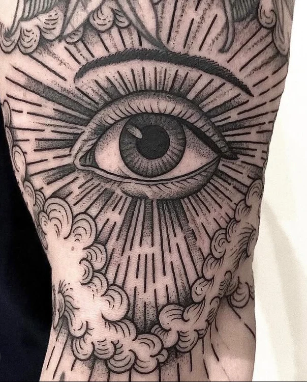 Blackwork Eye, Clouds tattoo on Outer arm