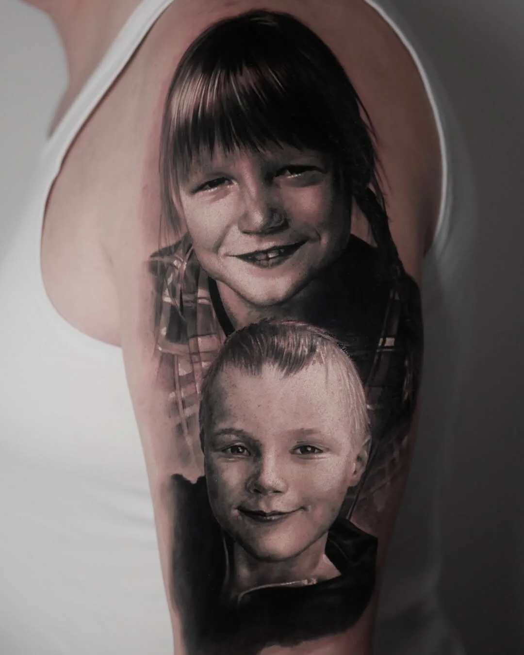 Deep shadow and volume: black and gray realism tattoo
