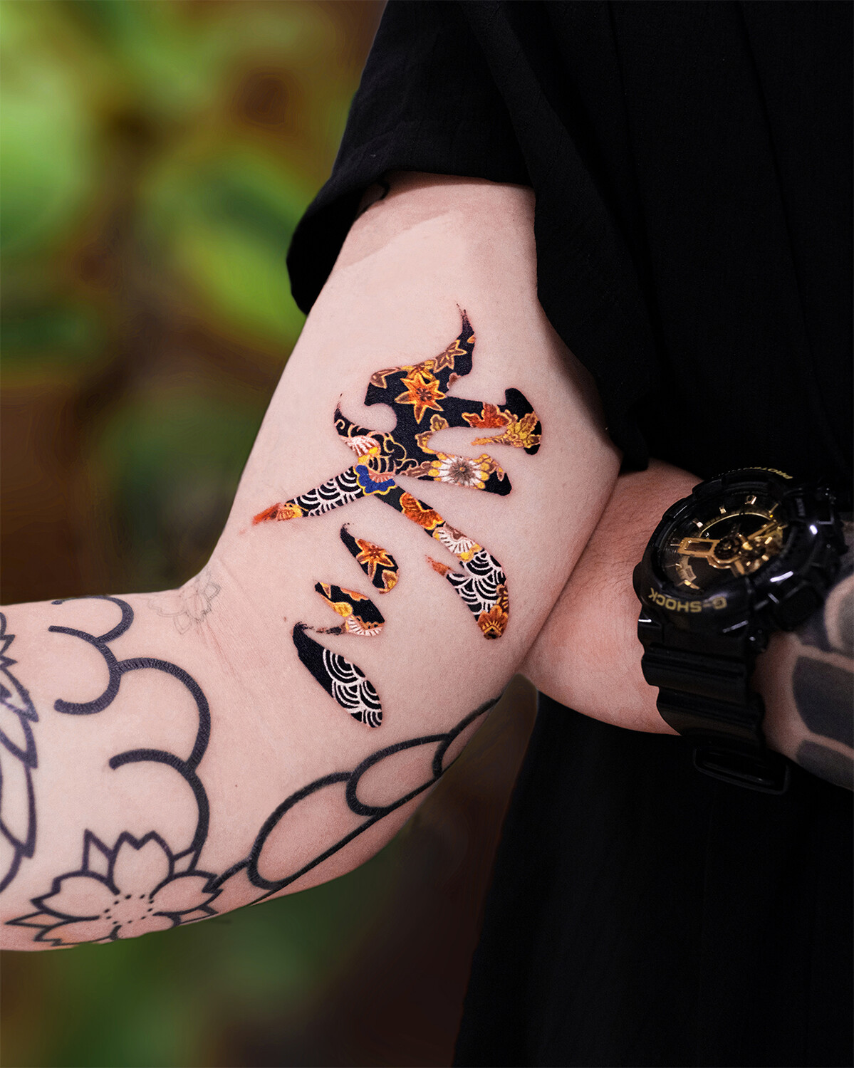 Tattoos by Nako: Chinese Calligraphy and Patterns