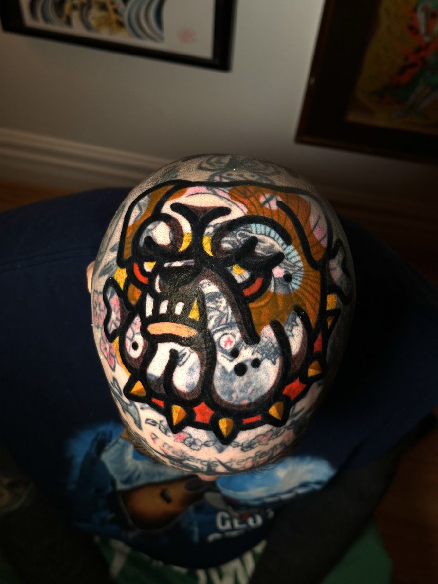 Traditional Bulldog, Spiked halo tattoo on Back of Neck
