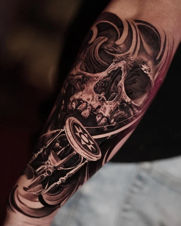 Realism Skull, Hourglass tattoo on Forearm