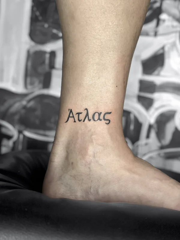 black lettering tattoo on ankle #99305 | Tattoo Artist Elena Voya