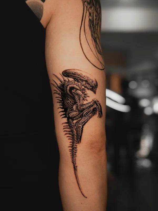 black and grey biomechanical tattoo on outer arm #99593 | Tattoo Artist YUJHI