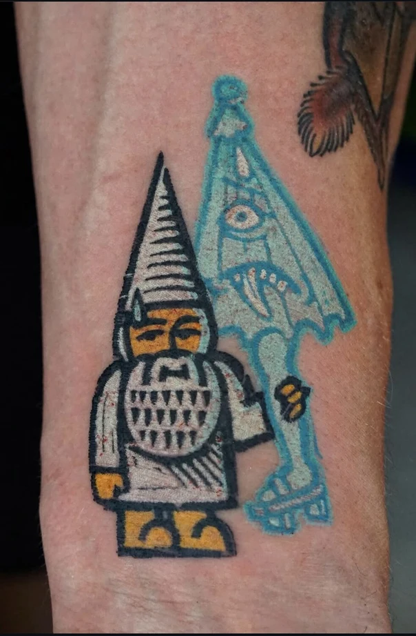 Illustrative Gnome, Eye tattoo on Forearm
