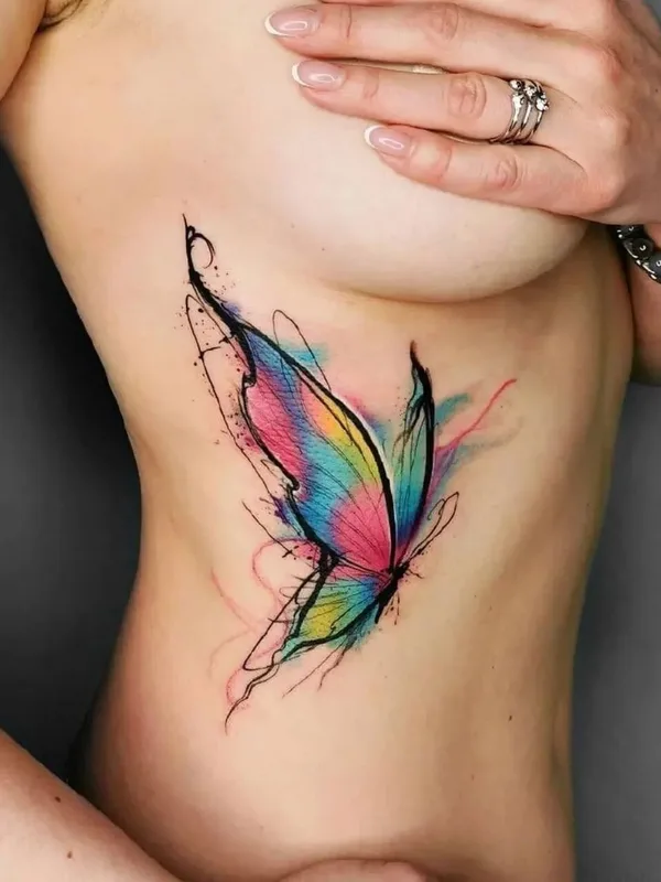 female color watercolor tattoo on breast #101475 | Tattoo Artist Егор Хлуднев