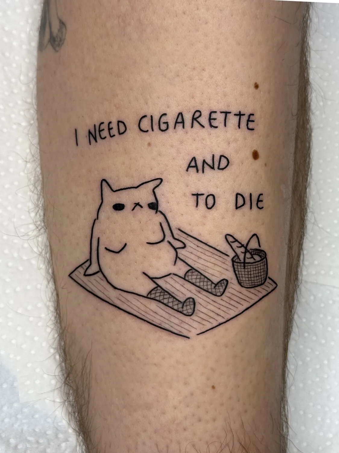Cat George tattoo