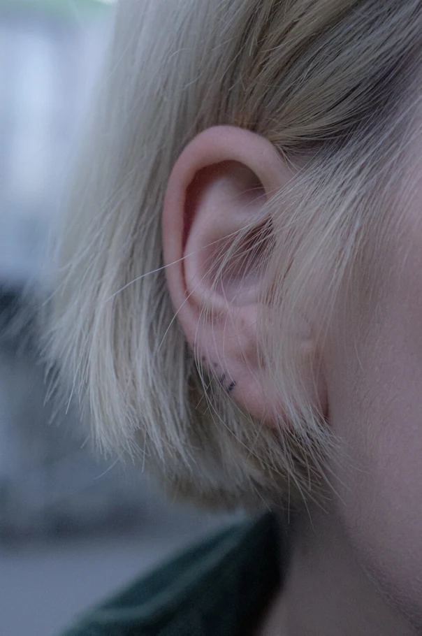 Minimalism Dot tattoo on Behind Ear