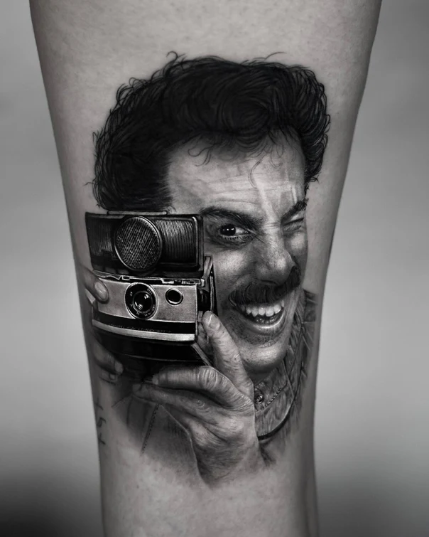 Realism Portrait, Camera tattoo on Thigh