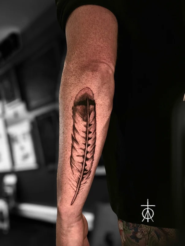 Black & Grey Feather tattoo on Forearm