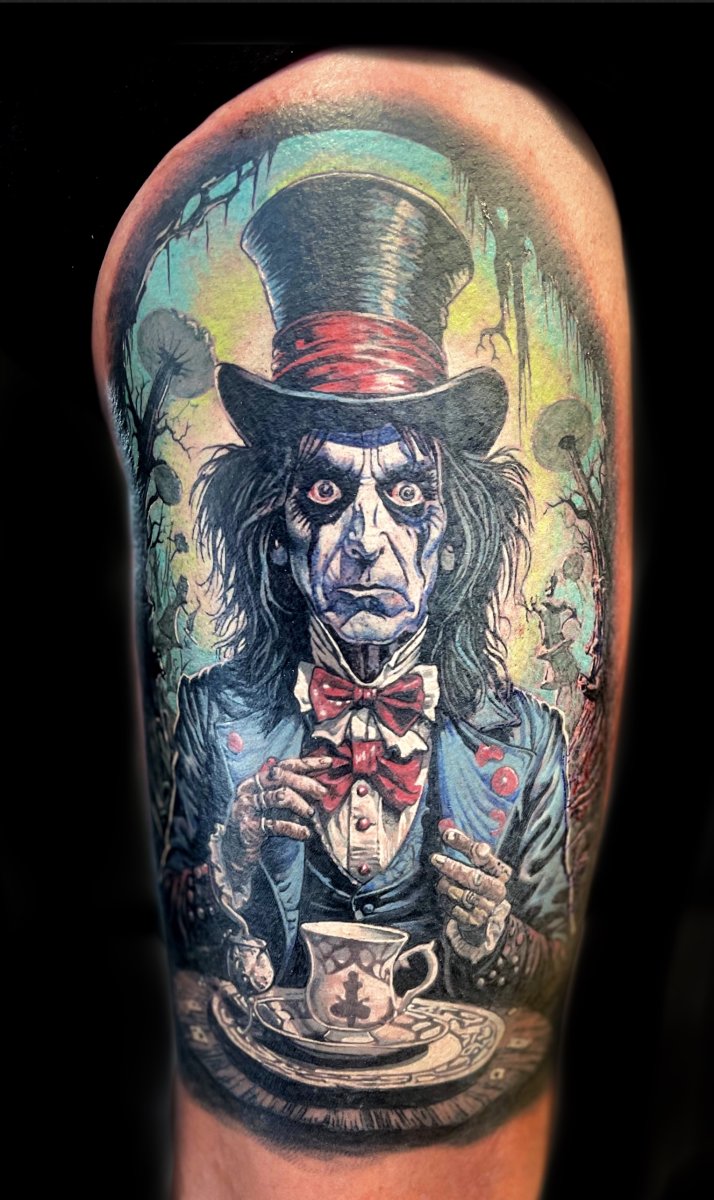 Illustrative Mad hatter, Top hat tattoo on Upper Arm
