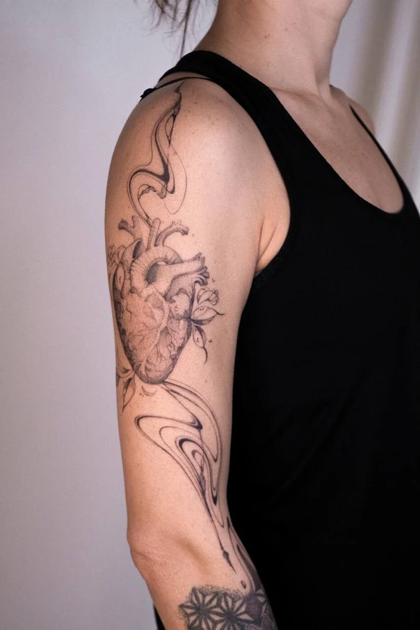Realism Heart, Floral tattoo on Upper Arm