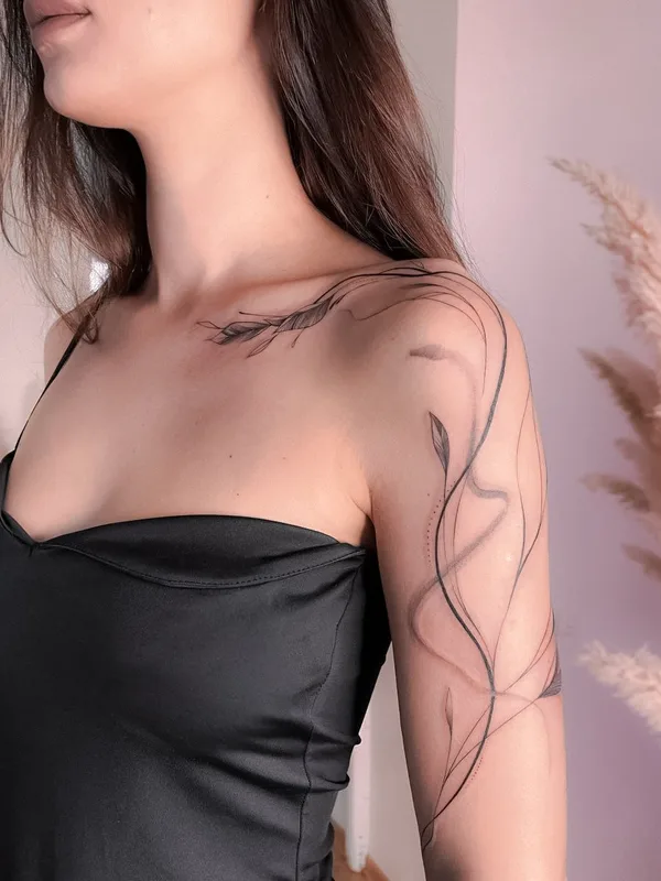 female black and grey fineline tattoo auf upper arm #130547 | Tätowierer Anastasiia Sheremetova