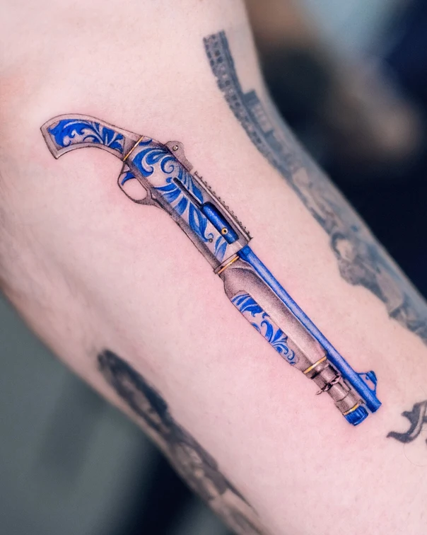 Illustrative Gun, Floral tattoo on Forearm