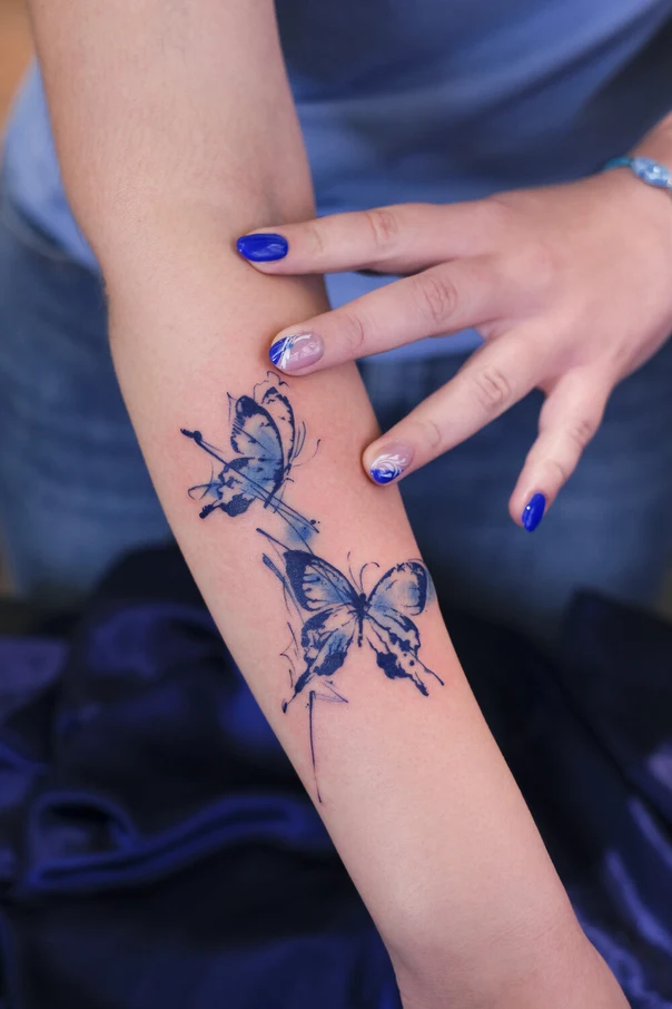 Watercolor Butterfly tattoo on Forearm