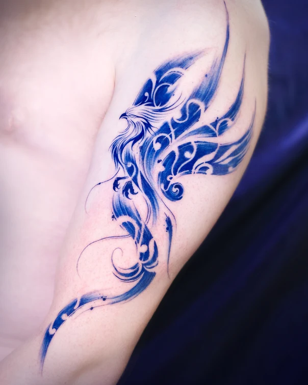 Watercolor Phoenix tattoo on Upper Arm