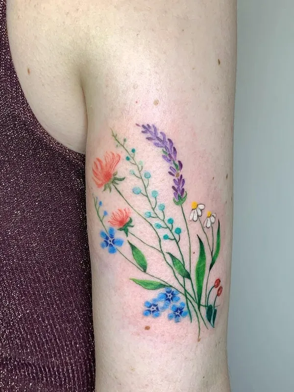 female color botanic Tatuagem em bicep #97971 | Tatuador Tatyana Boyko