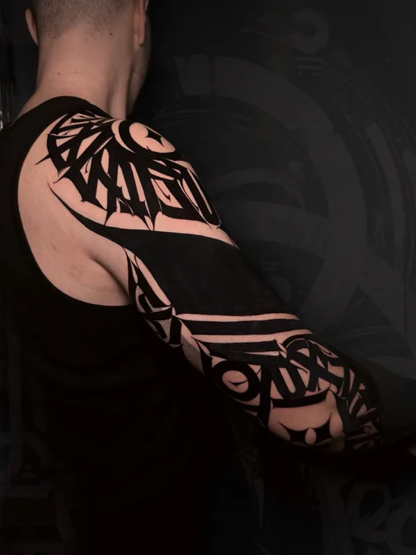male black calligraphy 纹身 在 sleeve #91364 | 纹身师 Mayya Gri