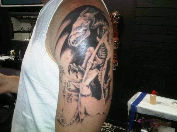 Tattoo by Iqhawe Tattoos at Iqhawe Tattoos