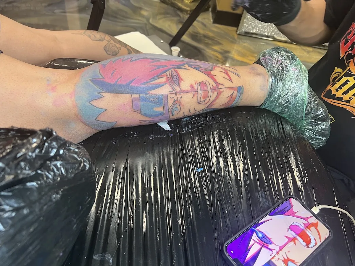 Tattoo by Manolito Tattoo and Cuban Art Gallery at Manolito Tattoo and Cuban Art Gallery