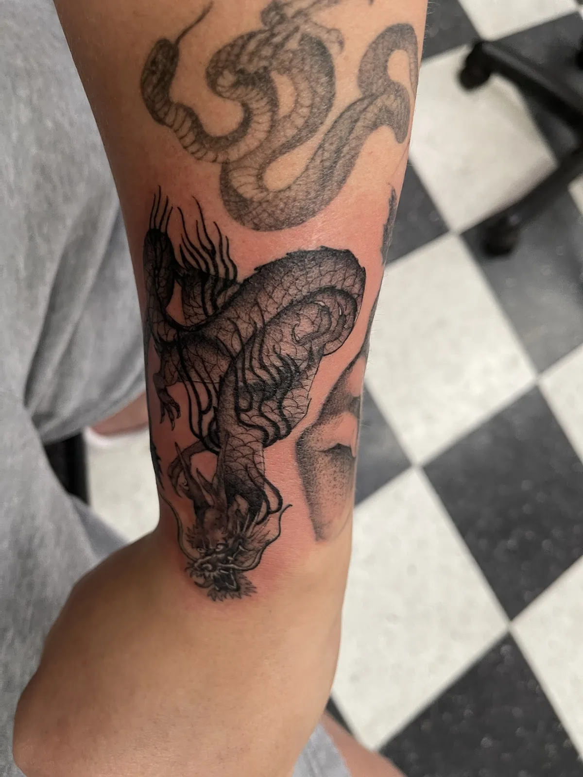 Tattoo by Mid Town Tattoo Shop at Mid Town Tattoo Shop