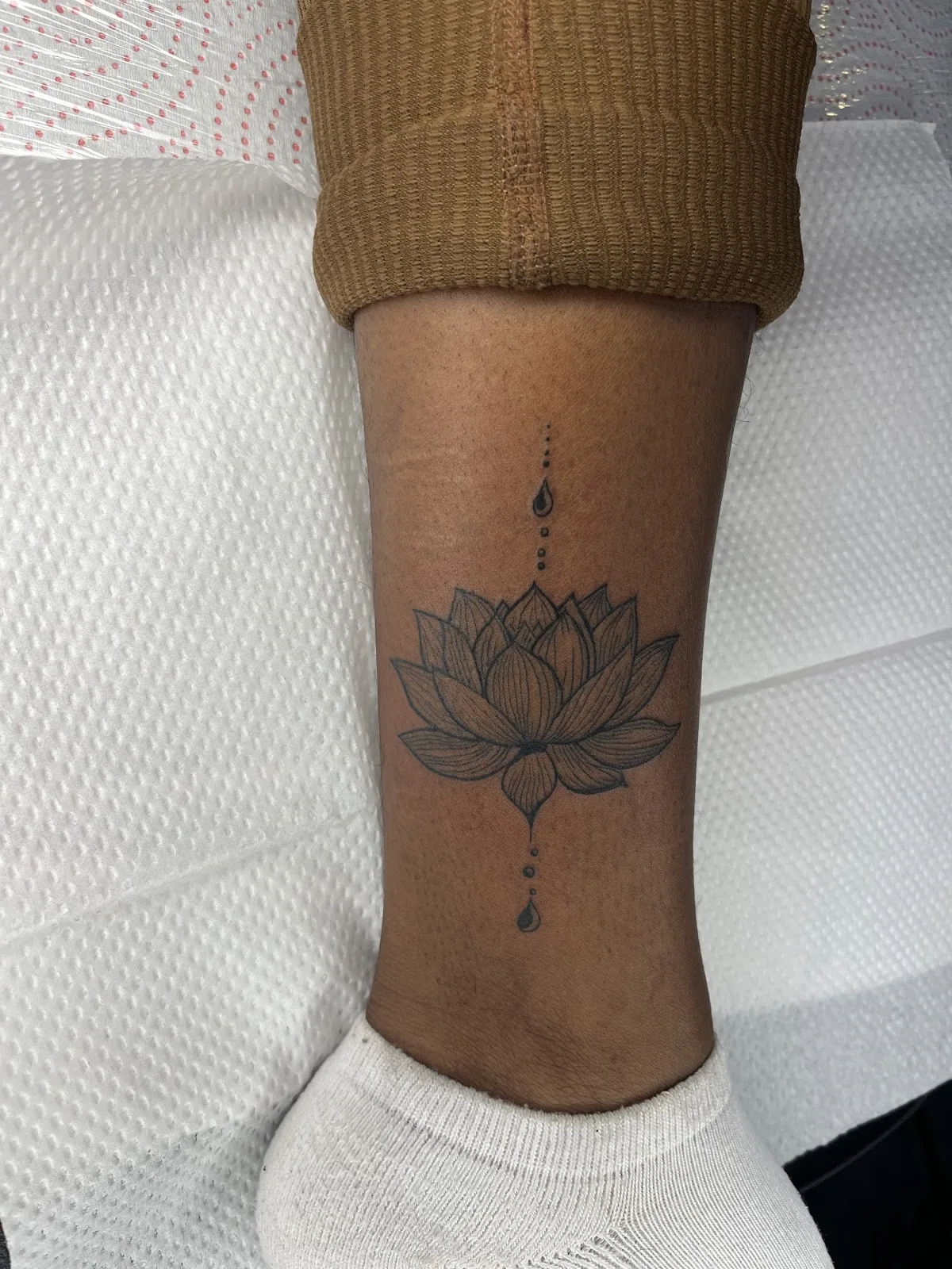 Tattoo by Msumbe tattoo and piercing shop at Msumbe tattoo and piercing shop