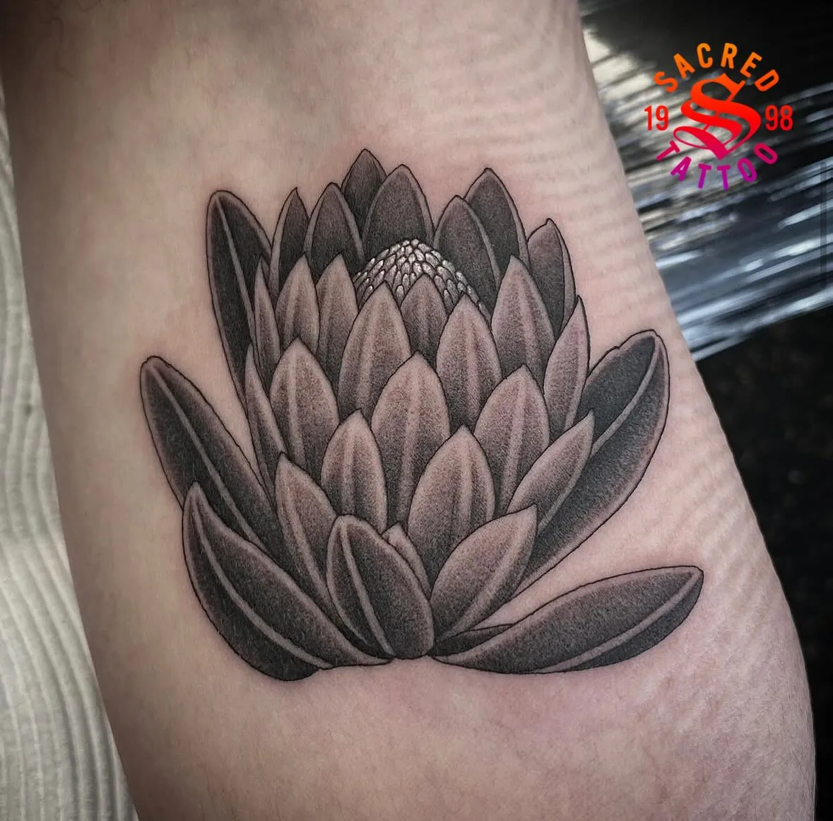 Tattoo by Sacred Tattoo at Sacred Tattoo