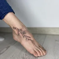 Ksana Slow tattoo