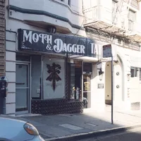 Moth and Dagger Tattoo Studio