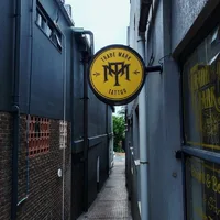 TRADE MARK TATTOO