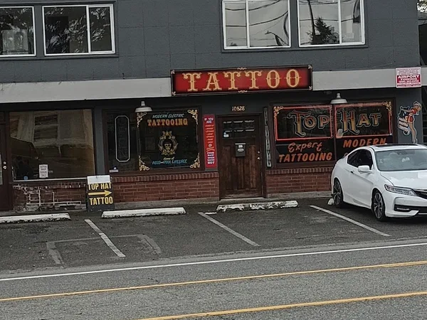 Top hat Tattoo and Top Hat Barber Shop