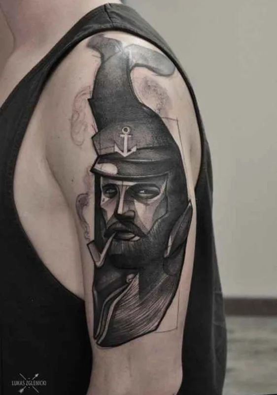black and grey blackwork tatuaje en upper arm #407 | Tatuador Lukas Zglenicki