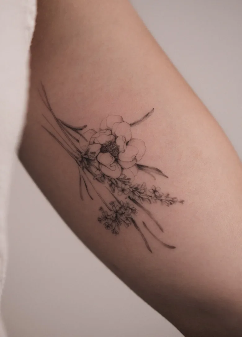 Fine line flower tattoo by Ksenia Way Ink
