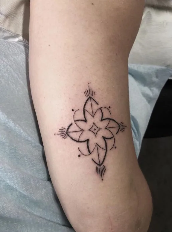 Tattoo artist X&eacute;u Jean