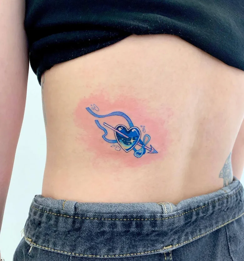 Tattoo artist Zvee